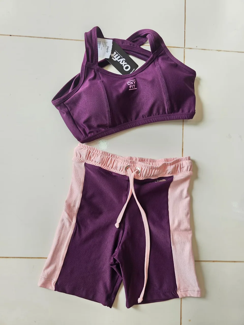 Conjunto Oxyfit roxo e rosa — Foto real, sem filtro